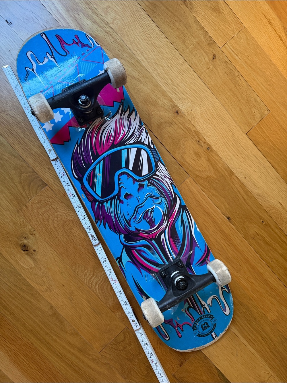 MADD Gear Skateboard with Monkey Design